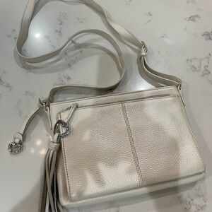 Brighton Cream Crossbody Bag with Tassel Detail